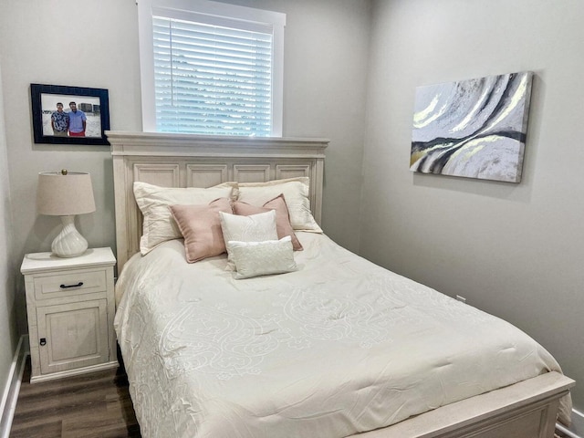 bedroom featuring dark hardwood / wood-style floors