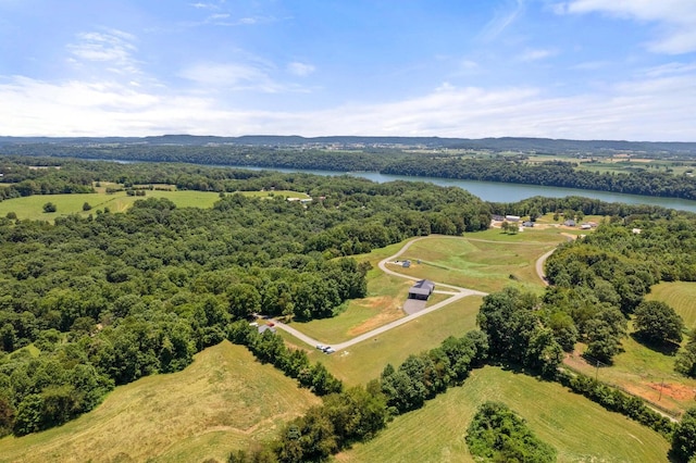 bird's eye view with a water view and a rural view