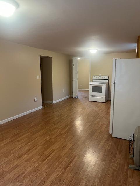 462 E Main St, Inez, KY 41224 - unfurnished living room featuring hardwood / wood-style flooring