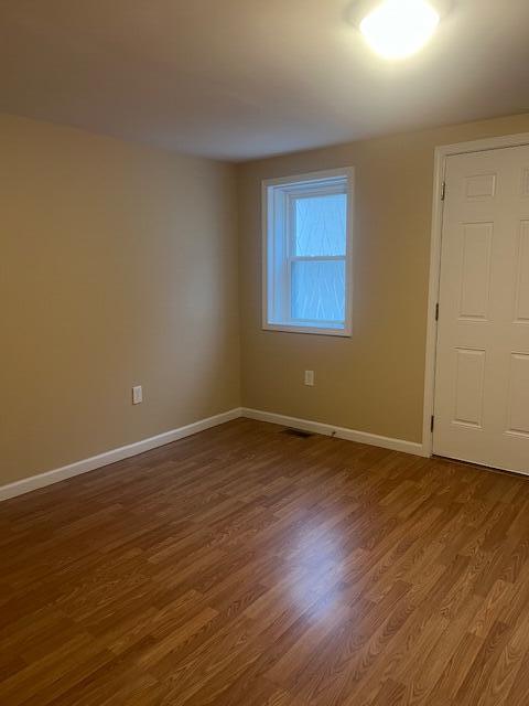 462 E Main St, Inez, KY 41224 - spare room with wood-type flooring
