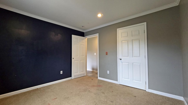 unfurnished bedroom with light carpet and ornamental molding