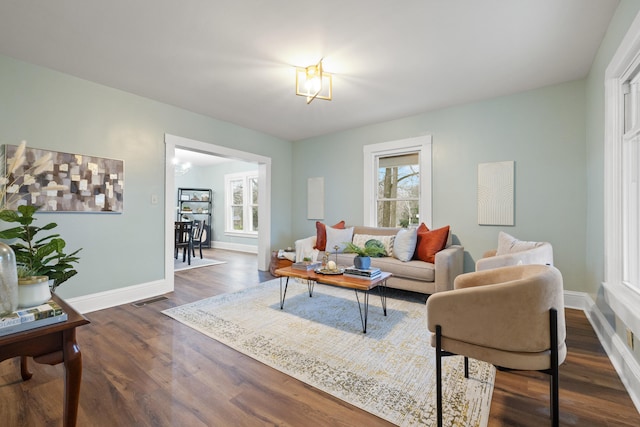 living room featuring dark hardwood / wood-style floors