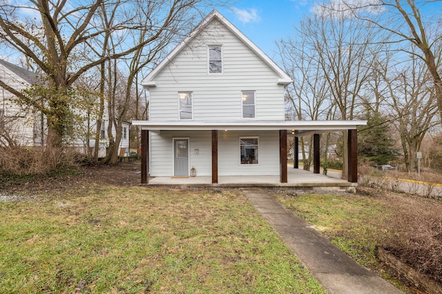 farmhouse-style home featuring a front yard and a porch