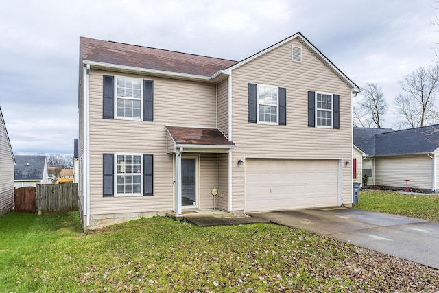 view of front of property featuring a front lawn and a garage