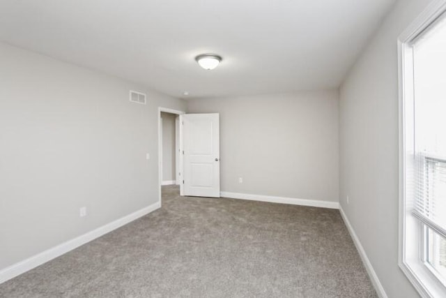 view of carpeted spare room