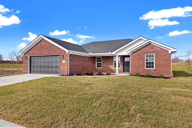 ranch-style home featuring a garage and a front yard