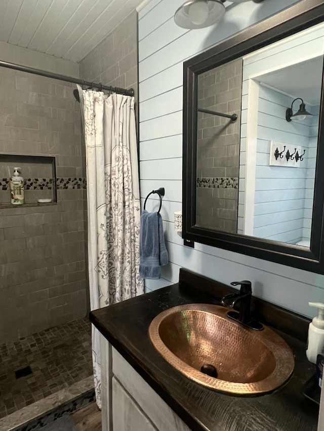 bathroom featuring vanity and walk in shower