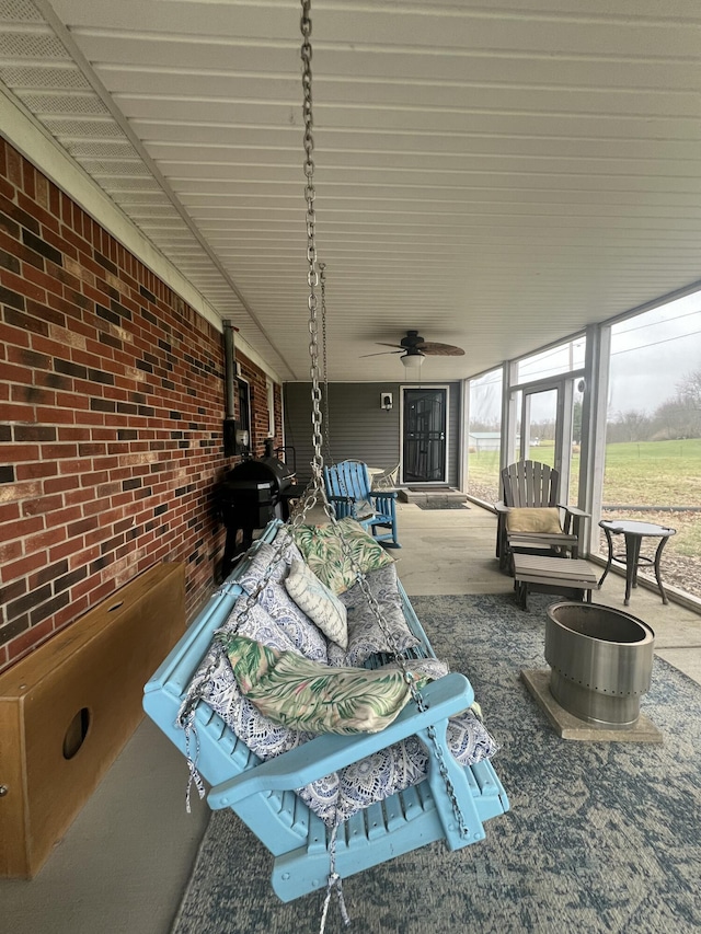 view of patio / terrace featuring ceiling fan and a grill