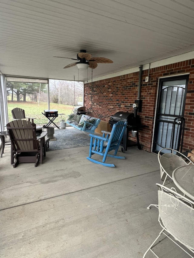 view of patio featuring a grill and ceiling fan