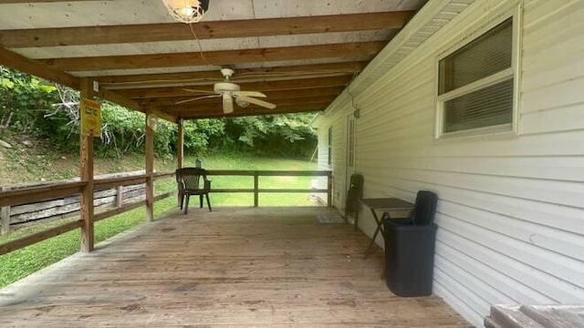 wooden terrace featuring ceiling fan