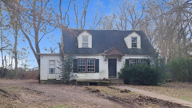 view of new england style home