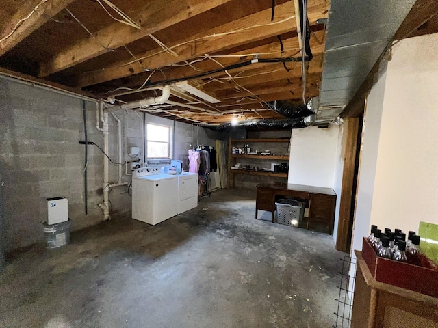 basement featuring washing machine and dryer