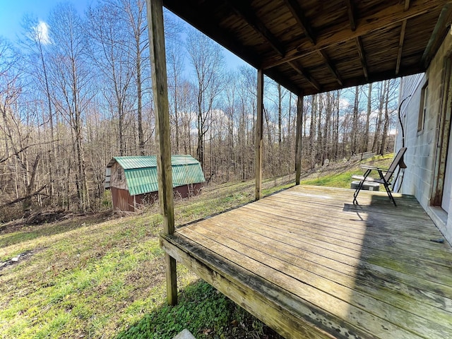 deck featuring a shed