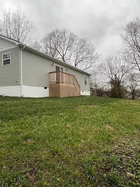 exterior space featuring a wooden deck