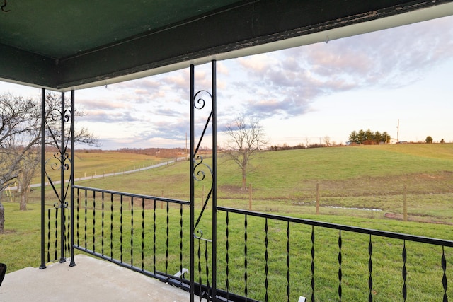 view of yard with a rural view