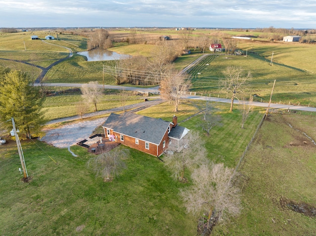 bird's eye view featuring a rural view and a water view