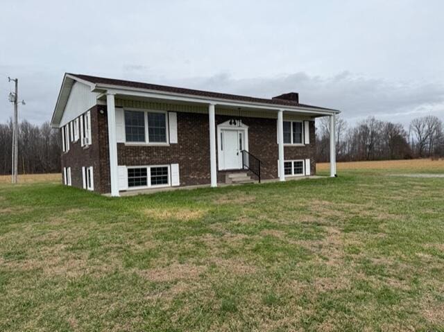 bi-level home featuring a front yard