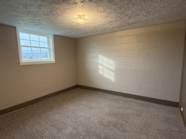 empty room with a textured ceiling