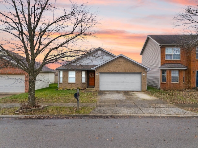 view of front of home with a garage