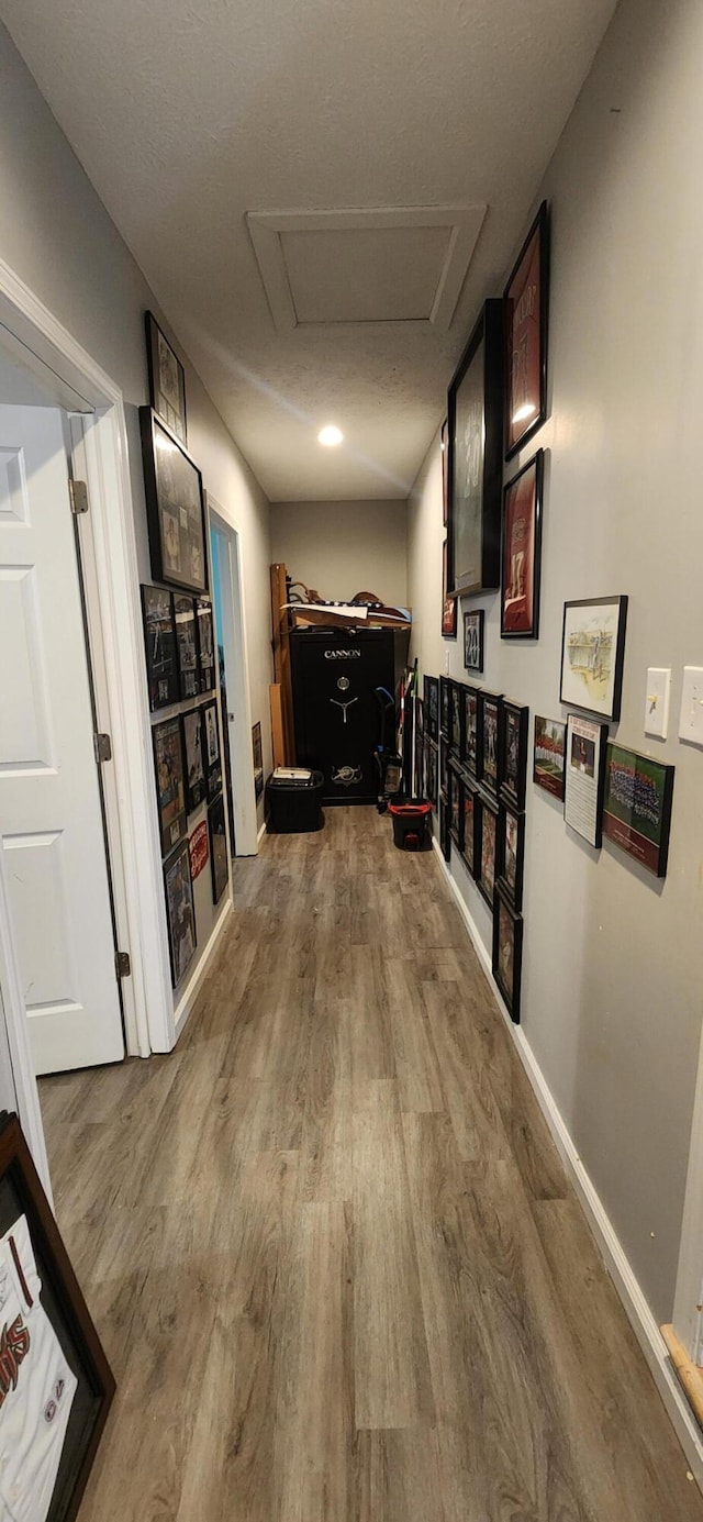 hallway featuring hardwood / wood-style floors