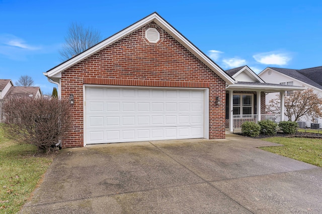 view of front of home featuring a garage and covered porch