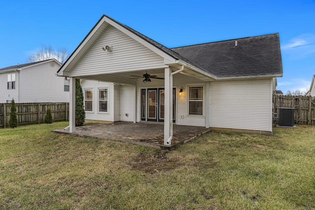 back of house with a lawn, central AC, ceiling fan, and a patio area