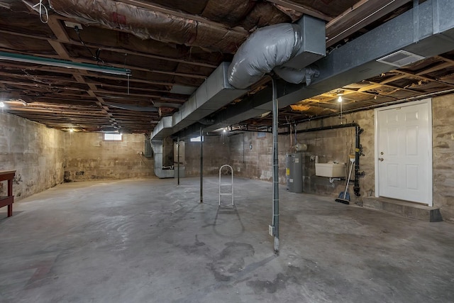 basement with sink and water heater