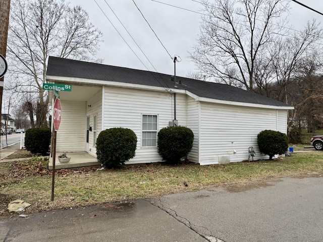 view of home's exterior featuring covered porch