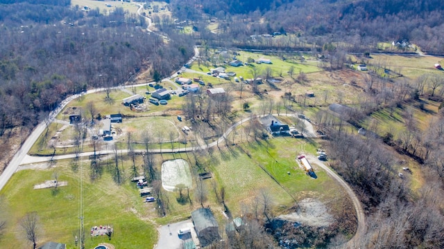 birds eye view of property with a rural view