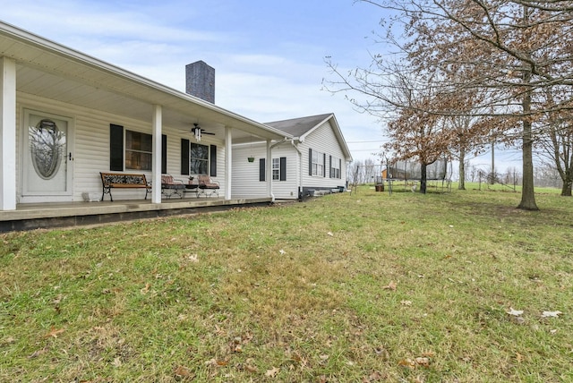 view of yard featuring covered porch