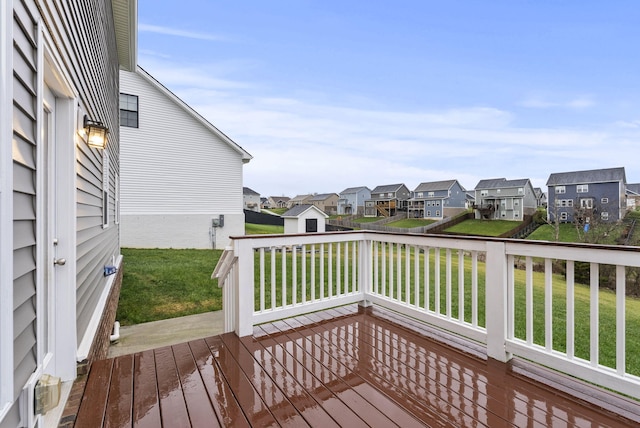 wooden deck with a yard