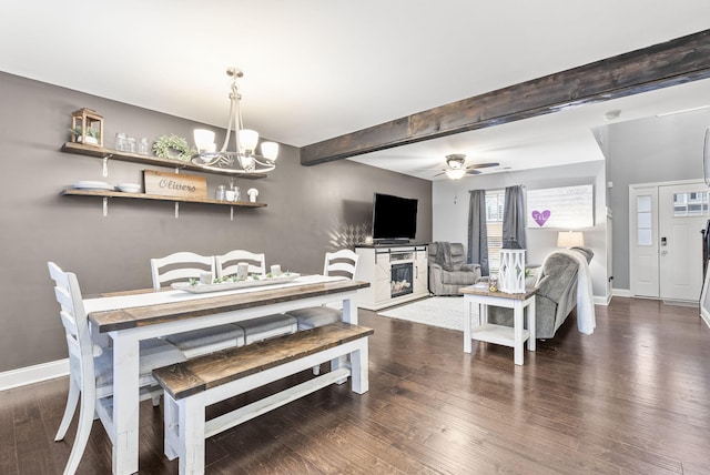 dining area featuring beam ceiling, ceiling fan with notable chandelier, and dark hardwood / wood-style floors