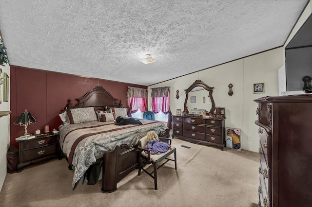 carpeted bedroom with a textured ceiling