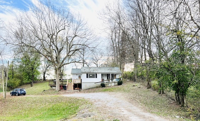 view of front of home with a wooden deck