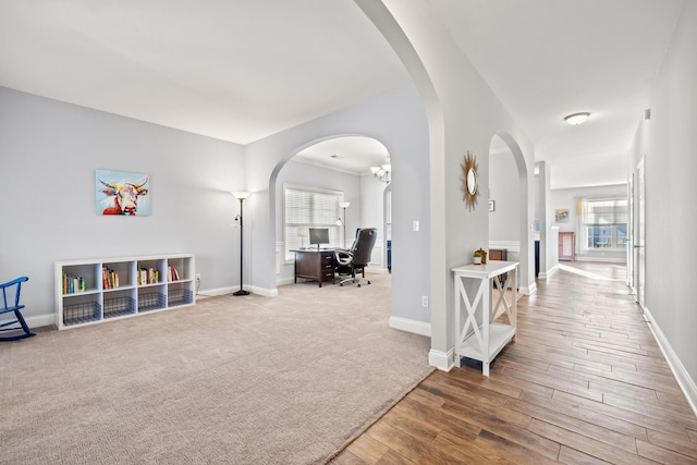 hall with wood-type flooring