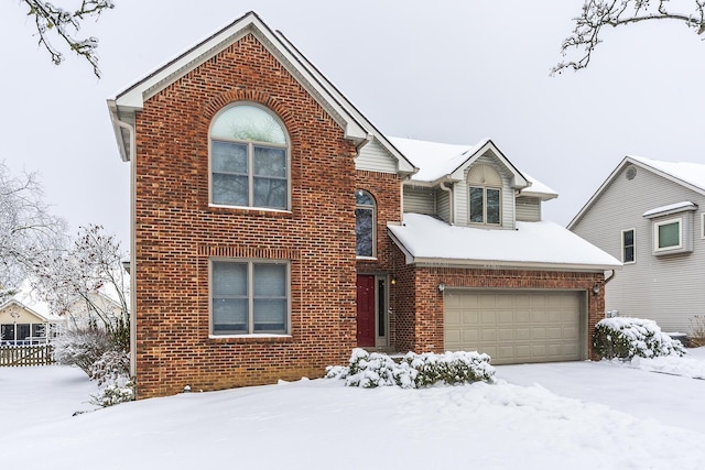 front of property with a garage