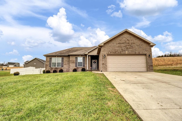 single story home with a garage and a front lawn