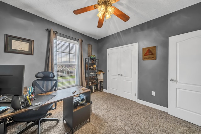 office with carpet, a textured ceiling, and ceiling fan