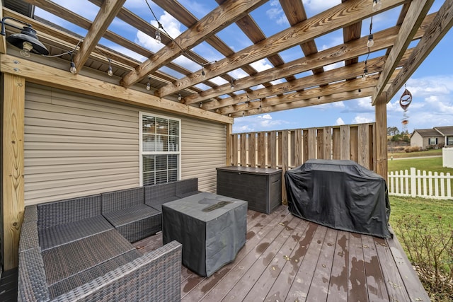 deck featuring outdoor lounge area, area for grilling, and a pergola