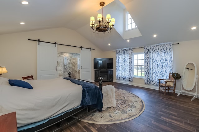 bedroom featuring a notable chandelier, dark hardwood / wood-style floors, a barn door, and vaulted ceiling