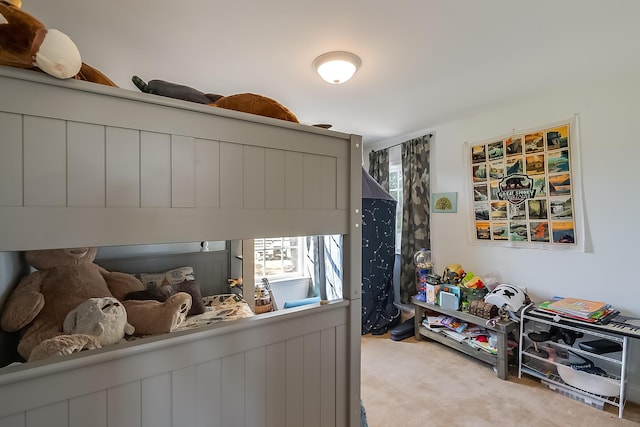 bedroom featuring light colored carpet