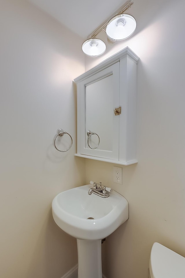 bathroom featuring toilet