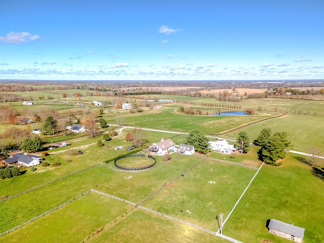 aerial view with a water view and a rural view