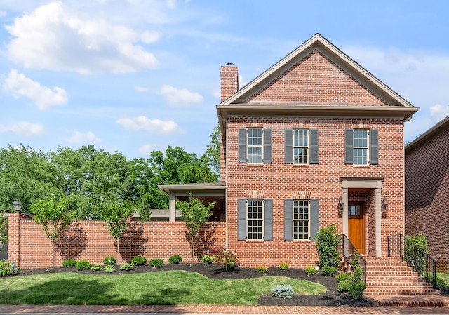 view of front facade with a front lawn