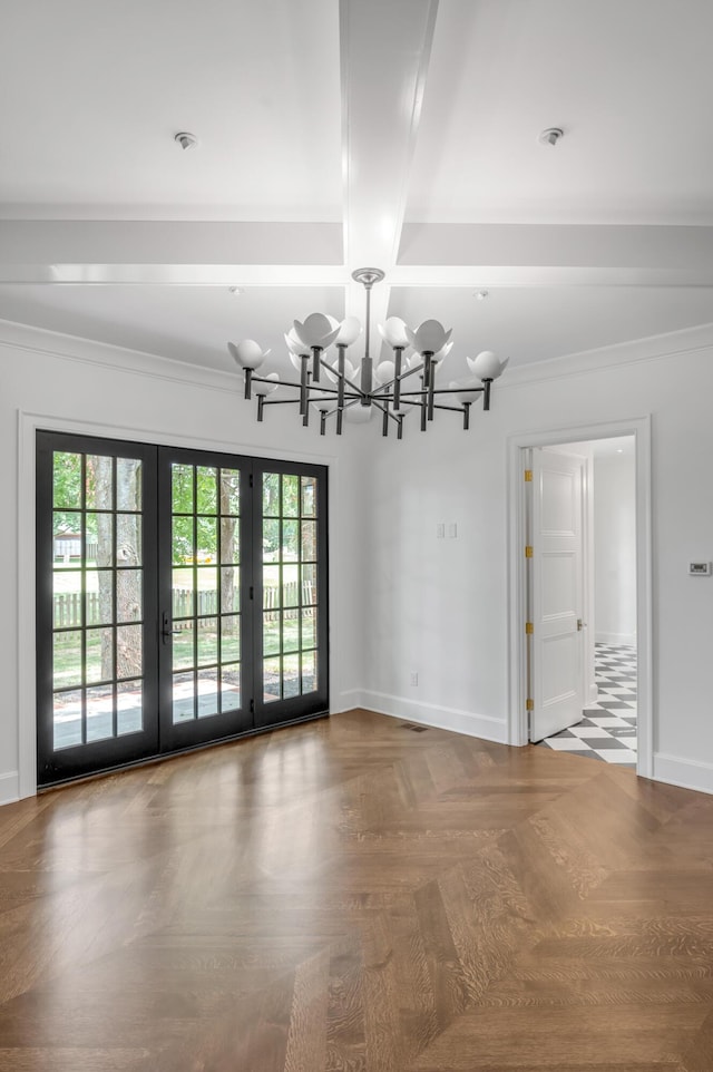 unfurnished dining area featuring a chandelier, french doors, ornamental molding, and parquet flooring