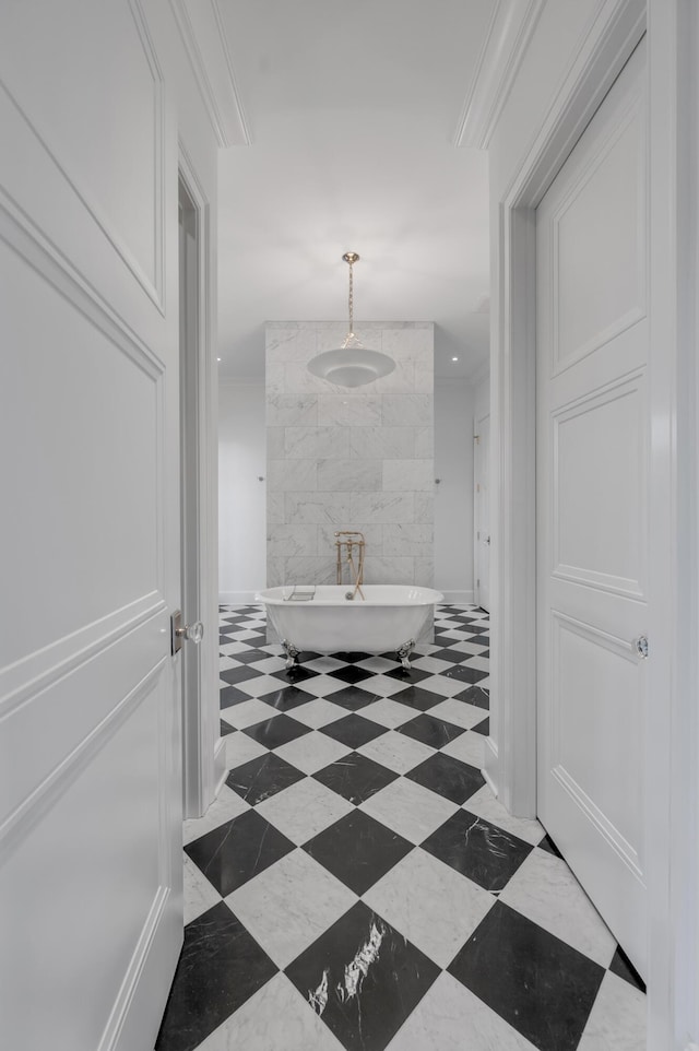 hallway featuring ornamental molding