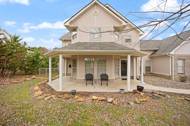 rear view of property with a patio area