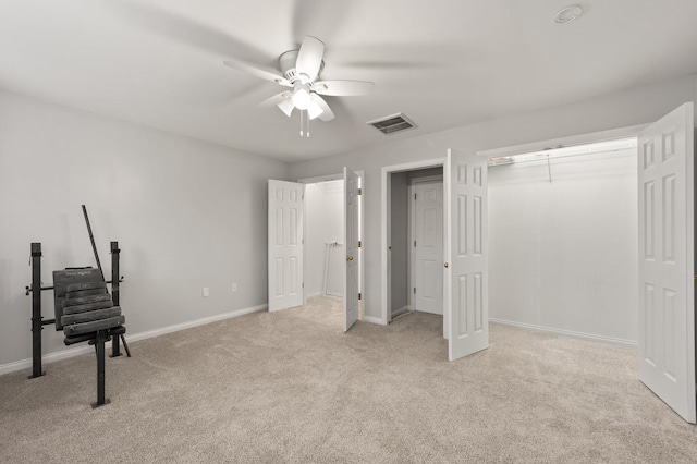 bedroom featuring light carpet and ceiling fan