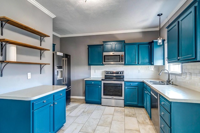 kitchen featuring pendant lighting, backsplash, sink, blue cabinetry, and appliances with stainless steel finishes