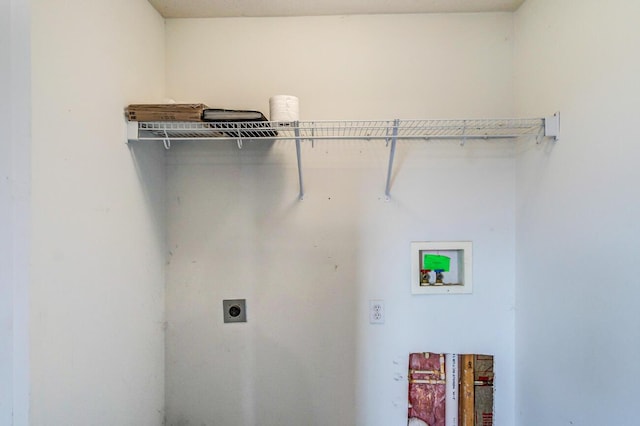 clothes washing area with washer hookup and electric dryer hookup